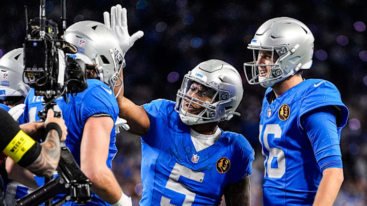 Detroit Lions wide receiver Isaac TeSlaa (18) celebrates a touchdown against against Green Bay Packers with running back David Montgomery (5) and quarterback Jared Goff (16) during the second half at Ford Field in Detroit on Thursday, Nov. 27, 2025. Detroit Lions wide receiver Isaac TeSlaa (18) celebrates a touchdown against against Green Bay Packers with running back David Montgomery (5) and quarterback Jared Goff (16) during the second half at Ford Field in Detroit on Thursday, Nov. 27, 2025.