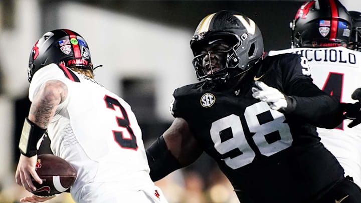 Vanderbilt defensive lineman De'Marion Thomas (98) sacks Ball State quarterback Kadin Semonza (3) during the second quarter at FirstBank Stadium in Nashville, Tenn., Saturday, Oct. 19, 2024. Vanderbilt defensive lineman De'Marion Thomas (98) sacks Ball State quarterback Kadin Semonza (3) during the second quarter at FirstBank Stadium in Nashville, Tenn., Saturday, Oct. 19, 2024.
