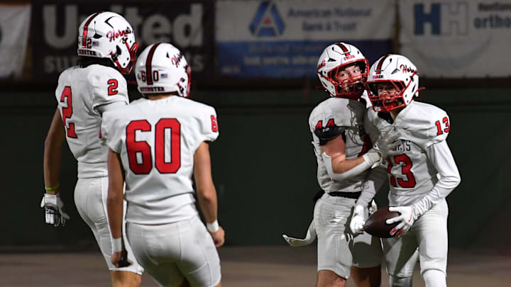 Muenster's Clayton Cunningham (13) scores a touchdown during a playoff game against Lindsay on Friday, Dec. 5, 2025 at Memorial Stadium.