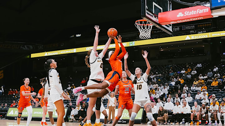 Illinois guard Jasmine Brown-Hagger drives to the rim against Missouri in the Illini's 70-62 win over the Tigers on Wednesday at. Mizzou Arena in Columbia, Missouri. Illinois guard Jasmine Brown-Hagger drives to the rim against Missouri in the Illini's 70-62 win over the Tigers on Wednesday at. Mizzou Arena in Columbia, Missouri.