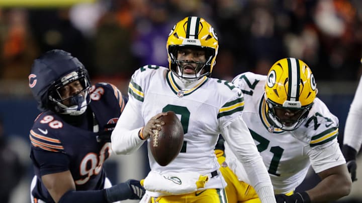 Malik Willis scrambles for a gain against the Chicago Bears during Saturday's 22-16 Bears win.