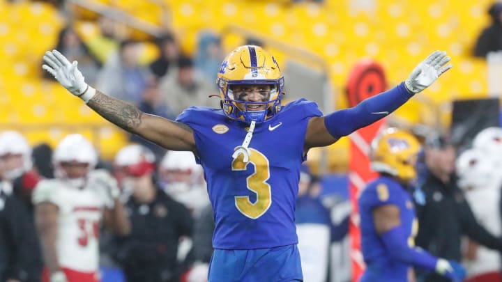 Oct 14, 2023; Pittsburgh, Pennsylvania, USA;  Pittsburgh Panthers defensive back Donovan McMillon (3) reacts after a defensive stop against the Louisville Cardinals during the fourth quarter at Acrisure Stadium. Mandatory Credit: Charles LeClaire-USA TODAY Sports