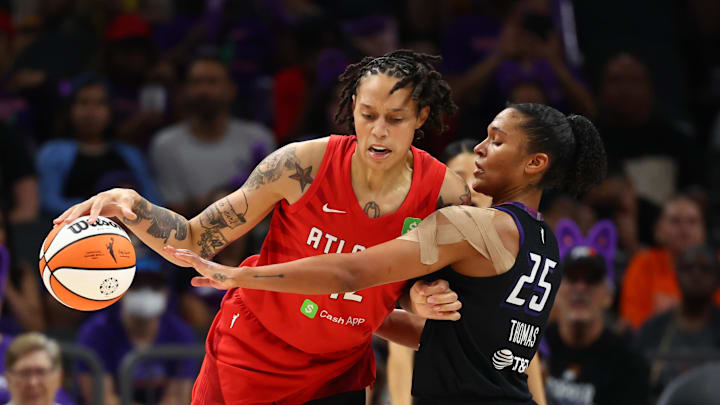 Aug 10, 2025; Phoenix, Arizona, USA; Phoenix Mercury forward Alyssa Thomas (25) defends against Atlanta Dream center Brittney Griner (42) in the second half at PHX Arena. Mandatory Credit: Mark J. Rebilas-Imagn Images
