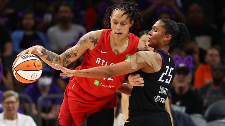 Aug 10, 2025; Phoenix, Arizona, USA; Phoenix Mercury forward Alyssa Thomas (25) defends against Atlanta Dream center Brittney Griner (42) in the second half at PHX Arena. Mandatory Credit: Mark J. Rebilas-Imagn Images