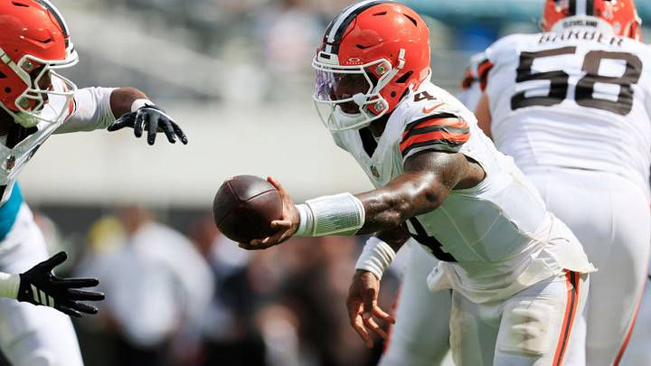 Cleveland Browns quarterback Deshaun Watson (4) hands off to wide receiver KC Concepcion Jr. (1) during the fourth quarter of an NFL football matchup at EverBank Stadium on Sunday, Sept. 13, 2026, in Jacksonville, Fla. The Jaguars defeated the Browns 34-10. [Corey Perrine/Florida Times-Union]