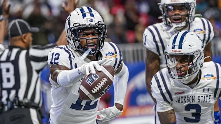Dec 17, 2022; Atlanta, GA, USA; Jackson State Tigers wide receiver Travis Hunter (12) reacts after catching a touchdown against the North Carolina Central Eagles during the second half during the Celebration Bowl at Mercedes-Benz Stadium. Mandatory Credit: Dale Zanine-Imagn Images