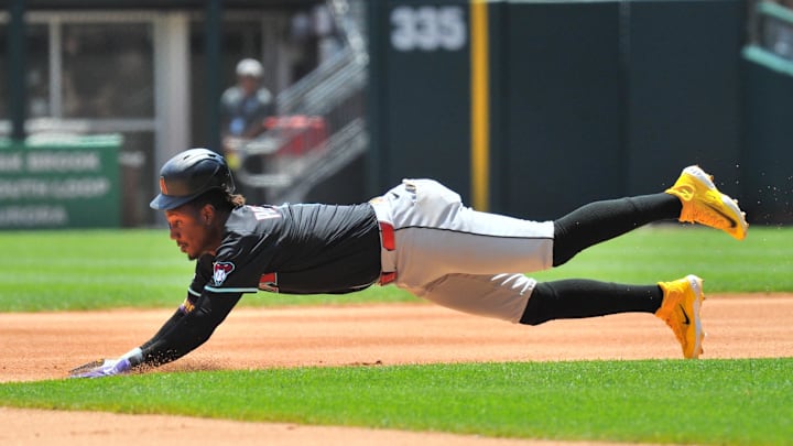 Jun 25, 2025; Chicago, Illinois, USA; Arizona Diamondbacks shortstop Geraldo Perdomo (2) slides and steals second base during the first inning against the Chicago White Sox at Rate Field. Mandatory Credit: Patrick Gorski-Imagn Images Jun 25, 2025; Chicago, Illinois, USA; Arizona Diamondbacks shortstop Geraldo Perdomo (2) slides and steals second base during the first inning against the Chicago White Sox at Rate Field. Mandatory Credit: Patrick Gorski-Imagn Images