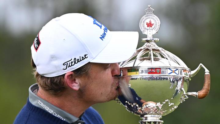 Jun 14, 2026; Caledon, Ontario, CAN; Bud Cauley kisses the trophy after winning the RBC Canadian Open golf tournament. Mandatory Credit: Dan Hamilton-Imagn Images Jun 14, 2026; Caledon, Ontario, CAN; Bud Cauley kisses the trophy after winning the RBC Canadian Open golf tournament. Mandatory Credit: Dan Hamilton-Imagn Images