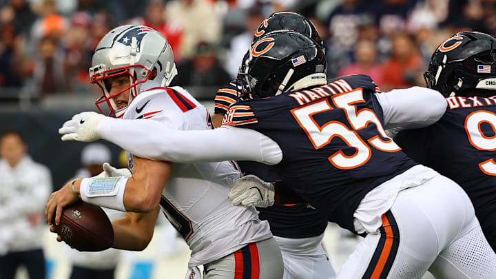 Jake Martin sacks Drake Maye in the first half of Sunday's Bears game with New England.