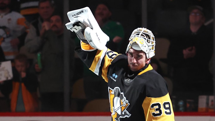 Mar 21, 2025; Pittsburgh, Pennsylvania, USA;  Pittsburgh Penguins goaltender Alex Nedeljkovic (39) reacts after being named a star of the game against the Columbus Blue Jackets at PPG Paints Arena. 
