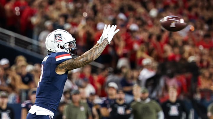 Oct 5, 2024; Tucson, Arizona, USA; Arizona Wildcats wide receiver Tetairoa McMillan (4) catches the ball during second quarter against Texas Tech Red Raiders at Arizona Stadium. Mandatory Credit: Aryanna Frank-Imagn Images