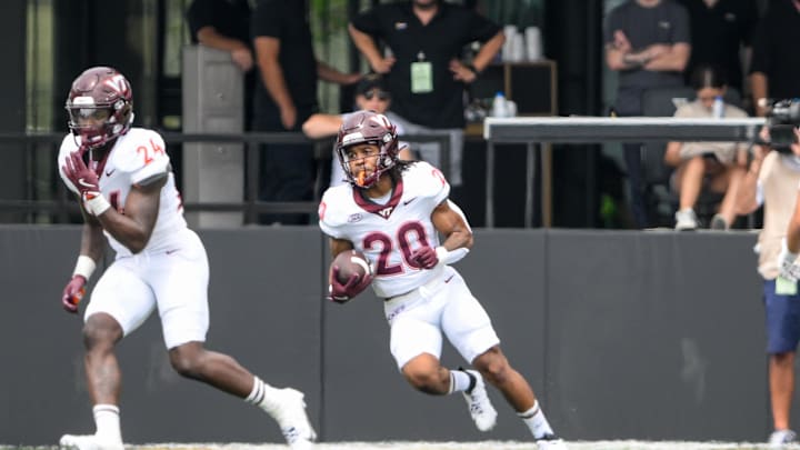 Aug 31, 2024; Nashville, Tennessee, USA; Virginia Tech Hokies running back P.J. Prioleau (20) runs the ball against the Vanderbilt Commodores during the second half at FirstBank Stadium. Mandatory Credit: Steve Roberts-Imagn Images Aug 31, 2024; Nashville, Tennessee, USA; Virginia Tech Hokies running back P.J. Prioleau (20) runs the ball against the Vanderbilt Commodores during the second half at FirstBank Stadium. Mandatory Credit: Steve Roberts-Imagn Images