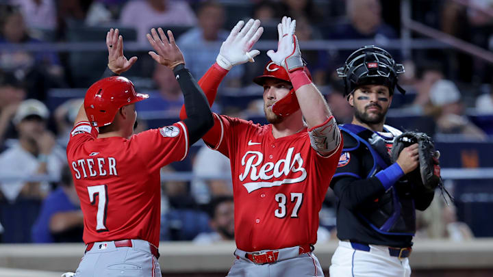 Jul 18, 2025; New York City, New York, USA; Cincinnati Reds designated hitter Tyler Stephenson (37) celebrates his two run home run against the New York Mets with first baseman Spencer Steer (7) in front of Mets catcher Luis Torrens (13) during the sixth inning at Citi Field. Mandatory Credit: Brad Penner-Imagn Images Jul 18, 2025; New York City, New York, USA; Cincinnati Reds designated hitter Tyler Stephenson (37) celebrates his two run home run against the New York Mets with first baseman Spencer Steer (7) in front of Mets catcher Luis Torrens (13) during the sixth inning at Citi Field. Mandatory Credit: Brad Penner-Imagn Images