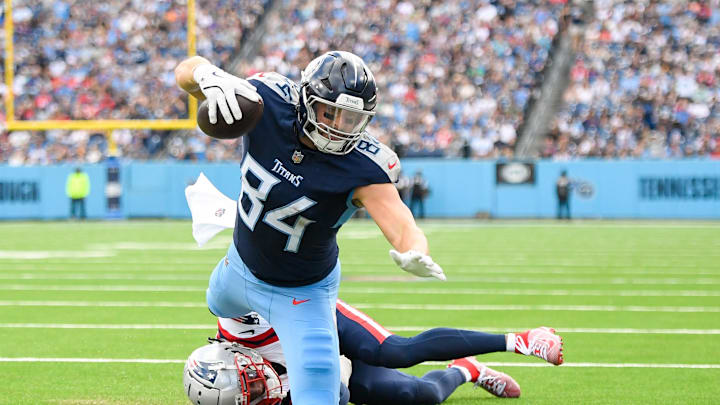 Tennessee Titans tight end Nick Vannett dives for the end zone dragging New England Patriots cornerback Marco Wilson. Mandatory Credit: Steve Roberts-Imagn Images Tennessee Titans tight end Nick Vannett dives for the end zone dragging New England Patriots cornerback Marco Wilson. Mandatory Credit: Steve Roberts-Imagn Images