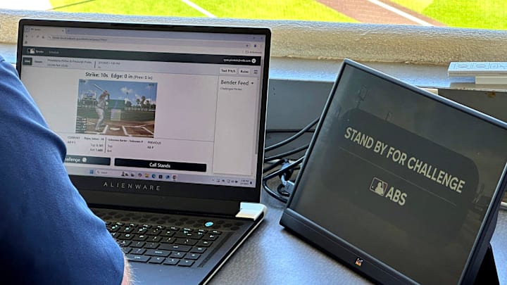 The ABS operator sits in the press box at LECOM Park during a spring training game between the Pittsburgh Pirates and Philadelphia Phillies on Friday, Mar. 7, 2025. Major League Baseball is testing an Automated Ball-Stike (ABS) challenge system at select spring training parks. The system allows players to challenge a limited number of ball/stike calls during a game. Calls can be overturned if the pitch tracking technology shows an umpire got a call wrong.
