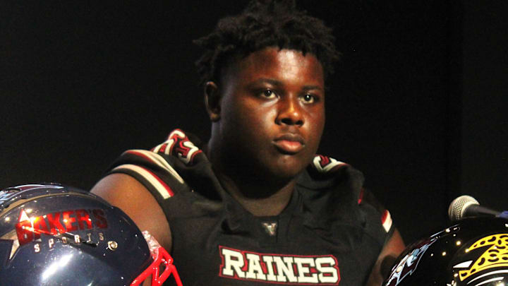 Raines offensive lineman Solomon Thomas listens to questions during Baker's Sports High School Media Day for football presented by Jaguars Prep at Jacksonville's EverBank Stadium on Aug. 1, 2024. [Clayton Freeman/Florida Times-Union]