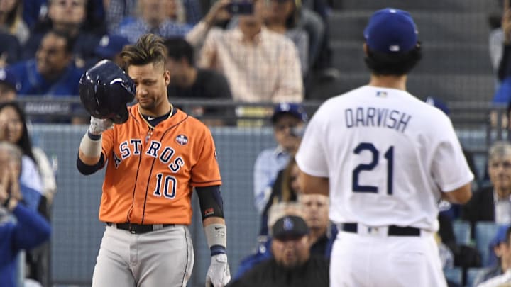 Nov 1, 2017; Los Angeles, CA, USA; Houston Astros first baseman Yuli Gurriel (10) at bat against Los Angeles Dodgers starting pitcher Yu Darvish (21) in the first inning in game seven of the 2017 World Series at Dodger Stadium. Mandatory Credit: Robert Hanashiro-Imagn Images Nov 1, 2017; Los Angeles, CA, USA; Houston Astros first baseman Yuli Gurriel (10) at bat against Los Angeles Dodgers starting pitcher Yu Darvish (21) in the first inning in game seven of the 2017 World Series at Dodger Stadium. Mandatory Credit: Robert Hanashiro-Imagn Images