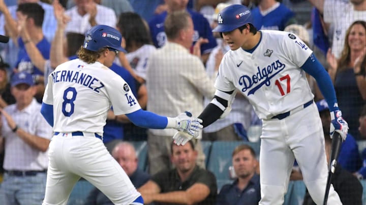 Oct 29, 2025; Los Angeles, California, USA; Los Angeles Dodgers first baseman Enrique Hernandez (8) celebrates with two-way player Shohei Ohtani (17) after hitting a home run against the Toronto Blue Jays in the third inning during game five of the 2025 MLB World Series at Dodger Stadium. Mandatory Credit: Jayne Kamin-Oncea-Imagn Images