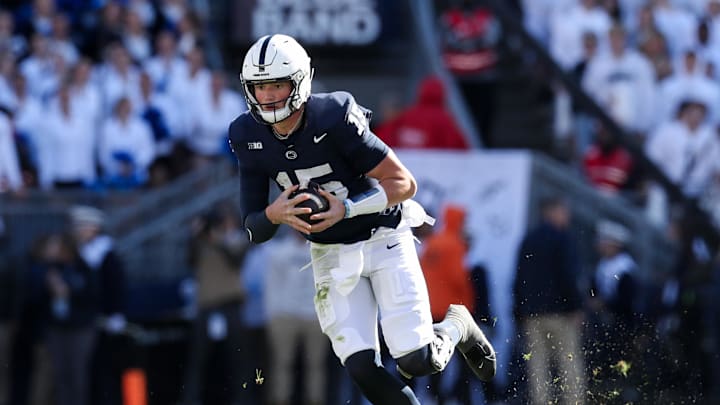 Penn State Nittany Lions quarterback Drew Allar runs with the ball during the first quarter against the Ohio State Buckeyes at Beaver Stadium. 