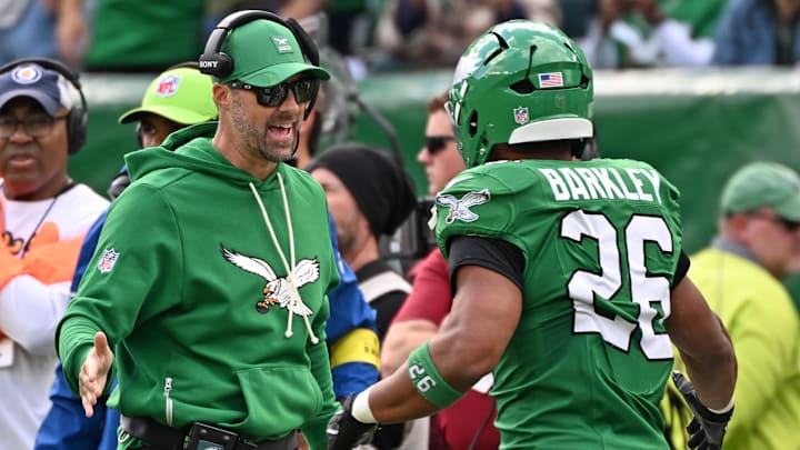 Oct 26, 2025; Philadelphia, Pennsylvania, USA; Philadelphia Eagles offensive coordinator Kevin Patullo and running back Saquon Barkley (26) against the New York Giants at Lincoln Financial Field. Mandatory Credit: Eric Hartline-Imagn Images