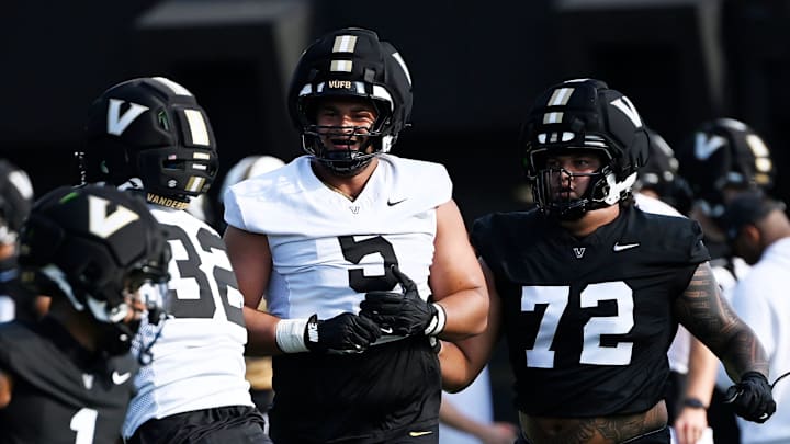Vanderbilt defensive lineman Yilanan Ouattara (5) runs back to the huddle during fall practice Wednesday, July 30, 2025, in Nashville, Tenn.