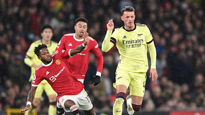 Fred and White compete for the ball Fred and White compete for the ball