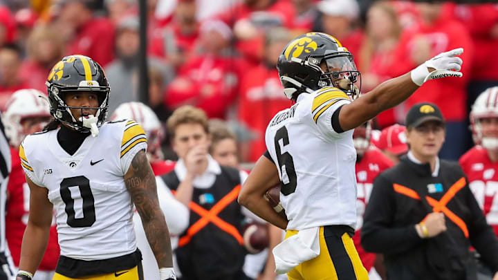 Iowa wide receiver Seth Anderson (6) signals for a first down against Wisconsin on Saturday, October 14, 2023, at Camp Randall Stadium in Madison, Wis. Iowa won the game, 12-6.