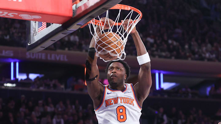 Jan 25, 2025; New York, New York, USA;  New York Knicks forward OG Anunoby (8) dunks against the Sacramento Kings in the second quarter at Madison Square Garden. Mandatory Credit: Wendell Cruz-Imagn Images