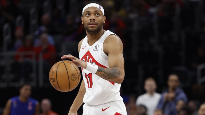 Mar 13, 2024; Detroit, Michigan, USA;  Toronto Raptors forward Bruce Brown (11) dribbles in the second half against the Detroit Pistons at Little Caesars Arena. Mandatory Credit: Rick Osentoski-USA TODAY Sports