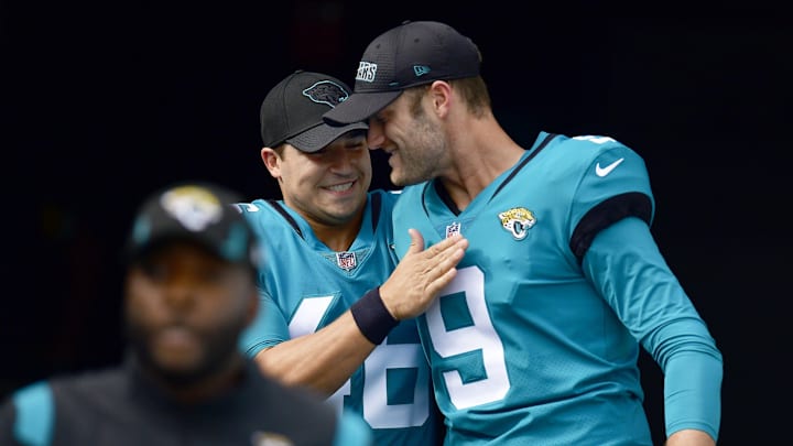 Jaguars long snapper Ross Matiscik (46) and punter Logan Cooke (9) talk during pregame warm ups. The Jacksonville Jaguars hosted the Houston Texans at TIAA Bank Field in Jacksonville, Florida Sunday, December 19, 2021. [Bob Self/Florida Times-Union]

Jki 121921 Bsjagsvstexans 3