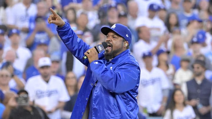 Oct 26, 2024; Los Angeles, California, USA; Recording artist Ice Cube performs on field before game two between the Los Angeles Dodgers and the New York Yankees in the 2024 MLB World Series at Dodger Stadium. Mandatory Credit: Jayne Kamin-Oncea-Imagn Images