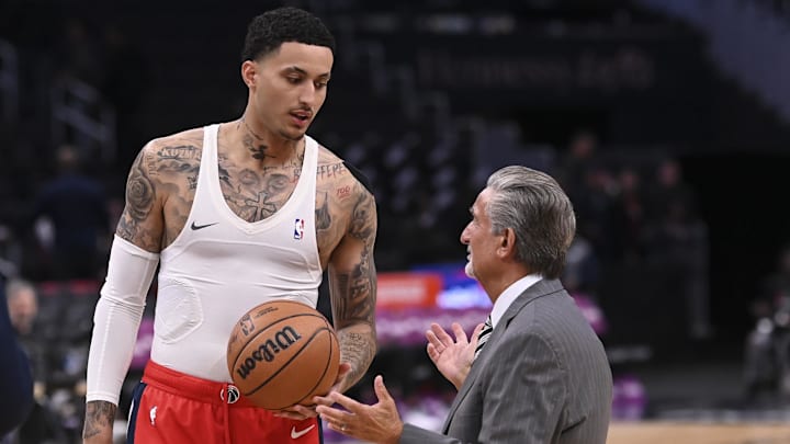 Mar 27, 2024; Washington, District of Columbia, USA;  Washington Wizards forward Kyle Kuzma (33) speaks with Monumental Sports & Entertainment CEO Ted Leonsis before the game against the Brooklyn Nets  at Capital One Arena. Mandatory Credit: Tommy Gilligan-Imagn Images