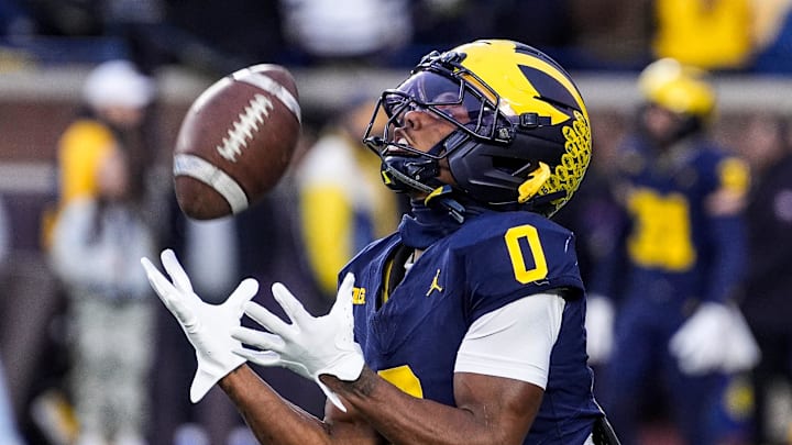 Michigan wide receiver Semaj Morgan (0) warms up ahead of the Purdue game at Michigan Stadium in Ann Arbor on Saturday, November 1, 2025.