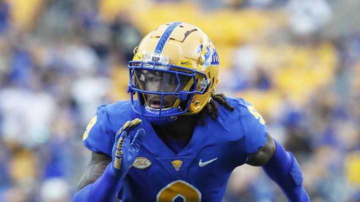 Oct 12, 2024; Pittsburgh, Pennsylvania, USA;  Pittsburgh Panthers defensive back Kyle Louis (9) pass rushes at he line of scrimmage against the California Golden Bears during the third quarter at Acrisure Stadium. Mandatory Credit: Charles LeClaire-Imagn Images