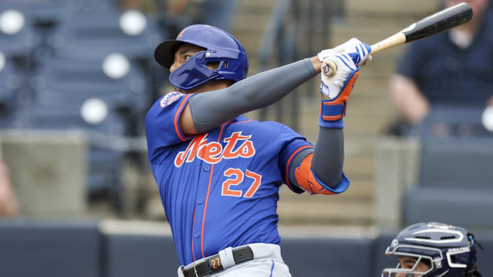 Mar 22, 2024; Tampa, Florida, USA;  New York Mets designated hitter Mark Vientos (27) hits a two run
