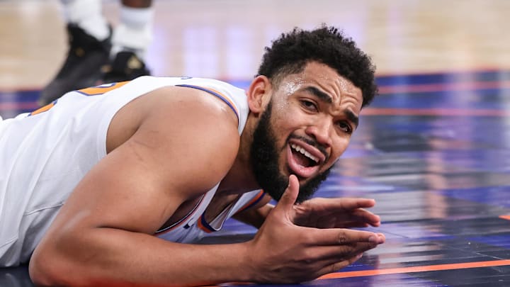 Jan 21, 2026; New York, New York, USA;  New York Knicks center Karl-Anthony Towns (32) reacts after geting called for an offensive foul in the second quarter against the Brooklyn Nets at Madison Square Garden. Mandatory Credit: Wendell Cruz-Imagn Images