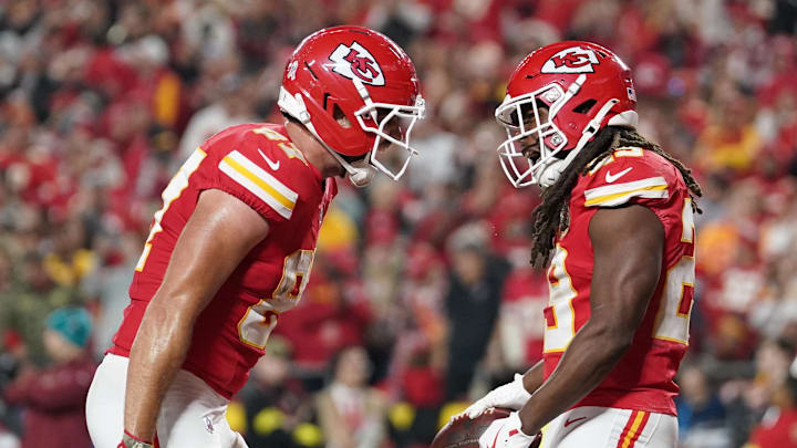 Oct 27, 2025; Kansas City, Missouri, USA; Kansas City Chiefs running back Kareem Hunt (29) celebrates after scoring a touchdown against the Washington Commanders with tight end Travis Kelce (87) during the third quarter of the game at GEHA Field at Arrowhead Stadium. Mandatory Credit: Denny Medley-Imagn Images