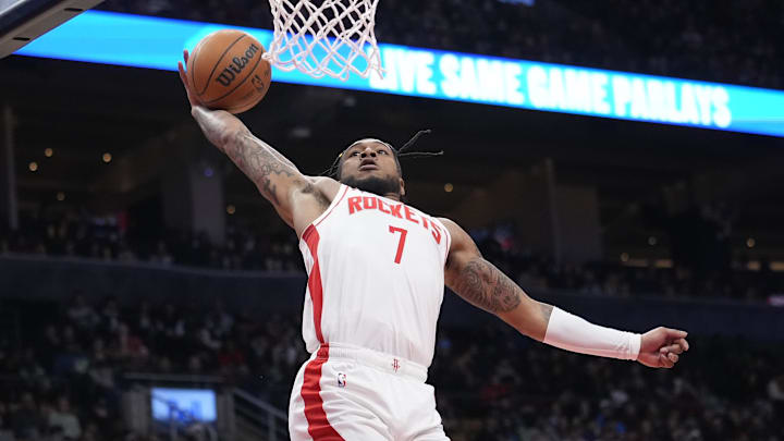 Dec 22, 2024; Toronto, Ontario, CAN; Houston Rockets forward Cam Whitmore (7) goes to dunk the ball against the Toronto Raptors during the second half at Scotiabank Arena. Mandatory Credit: John E. Sokolowski-Imagn Images