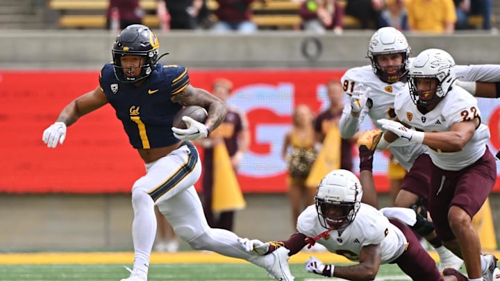 Sep 30, 2023; Berkeley, California, USA; California Golden Bears running back Jaydn Ott (1) evades