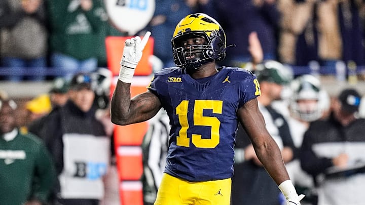 Michigan linebacker Ernest Hausmann (15) celebrates a play against Michigan State during the first half at Michigan Stadium in Ann Arbor on Saturday, Oct. 26, 2024.
