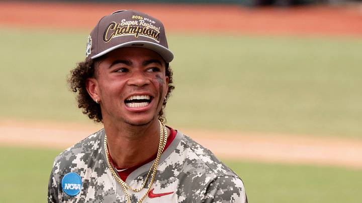 Jun 8, 2026; Tuscaloosa, AL, USA; Alabama shortstop Justin Lebron (1) is all smiles as the Crimson Tide players and coaches celebrate their 7-2 win over St. John’s to earn a trip to the College World Series. Jun 8, 2026; Tuscaloosa, AL, USA; Alabama shortstop Justin Lebron (1) is all smiles as the Crimson Tide players and coaches celebrate their 7-2 win over St. John’s to earn a trip to the College World Series.