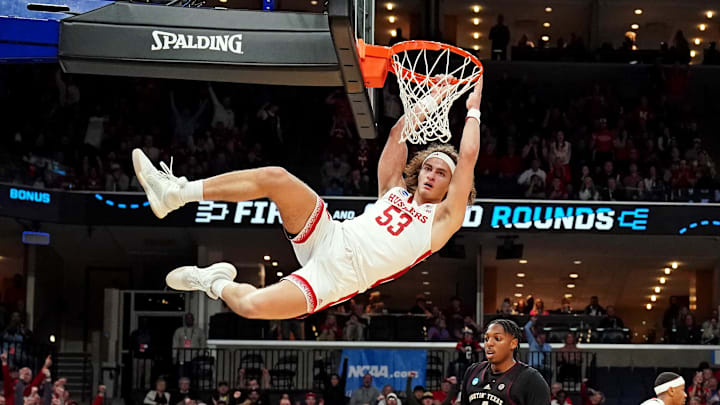 Nebraska forward Josiah Allick dunks the ball against Texas A&M during the first round of the 2024 NCAA Tournament.