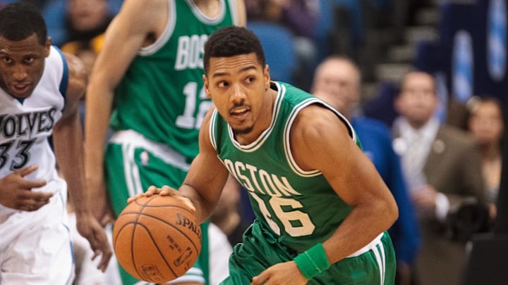 Jan 28, 2015; Minneapolis, MN, USA; Boston Celtics guard Phil Pressey (26) dribbles in the third quarter against the Minnesota Timberwolves at Target Center. The Minnesota Timberwolves beat the Boston Celtics 110-98. Mandatory Credit: Brad Rempel-Imagn Images Jan 28, 2015; Minneapolis, MN, USA; Boston Celtics guard Phil Pressey (26) dribbles in the third quarter against the Minnesota Timberwolves at Target Center. The Minnesota Timberwolves beat the Boston Celtics 110-98. Mandatory Credit: Brad Rempel-Imagn Images