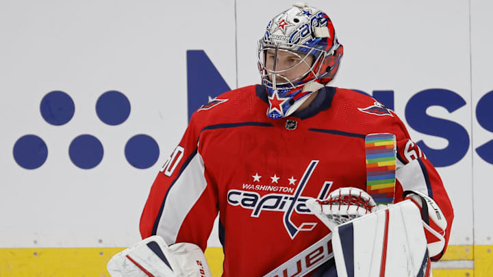 Mar 3, 2022; Washington, District of Columbia, USA; Washington Capitals goaltender Zach Fucale (60) kneels on the ice during warmups with rainbow stick tape in honor of Pride Night prior to the game against the Carolina Hurricanes at Capital One Arena. Mandatory Credit: Geoff Burke-Imagn Images Mar 3, 2022; Washington, District of Columbia, USA; Washington Capitals goaltender Zach Fucale (60) kneels on the ice during warmups with rainbow stick tape in honor of Pride Night prior to the game against the Carolina Hurricanes at Capital One Arena. Mandatory Credit: Geoff Burke-Imagn Images