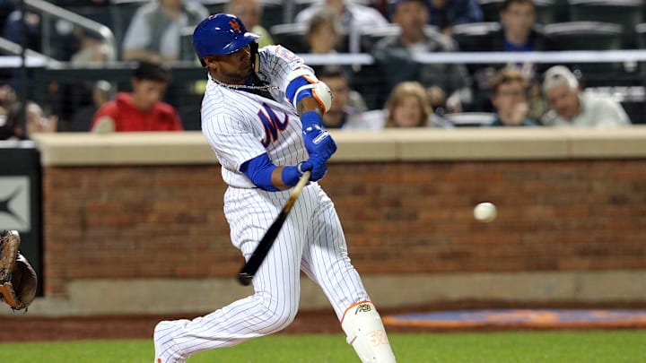 May 1, 2018; New York City, NY, USA; New York Mets left fielder Yoenis Cespedes (52) hits a solo home run against the Atlanta Braves during the sixth inning at Citi Field. Mandatory Credit: Brad Penner-Imagn Images May 1, 2018; New York City, NY, USA; New York Mets left fielder Yoenis Cespedes (52) hits a solo home run against the Atlanta Braves during the sixth inning at Citi Field. Mandatory Credit: Brad Penner-Imagn Images