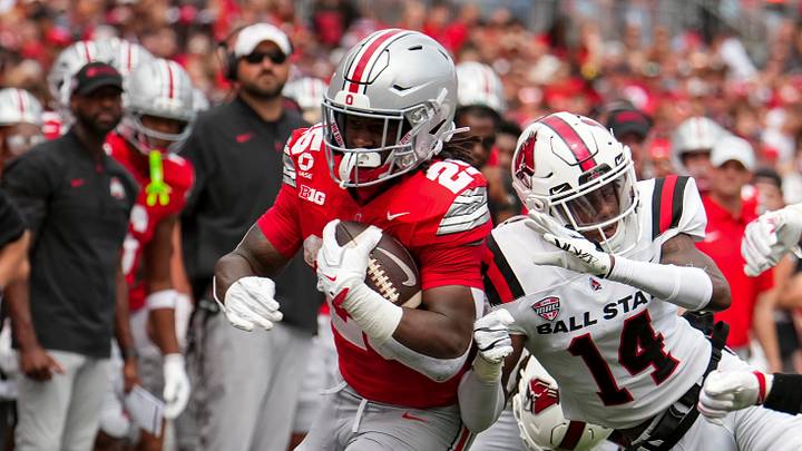 Ball State Cardinals defensive back Anthony Pinnace (14) hits Ohio State Buckeyes running back Bo Jackson (25) during the NCAA football game at Ohio Stadium in Columbus on Sept. 5, 2026. Ball State Cardinals defensive back Anthony Pinnace (14) hits Ohio State Buckeyes running back Bo Jackson (25) during the NCAA football game at Ohio Stadium in Columbus on Sept. 5, 2026.