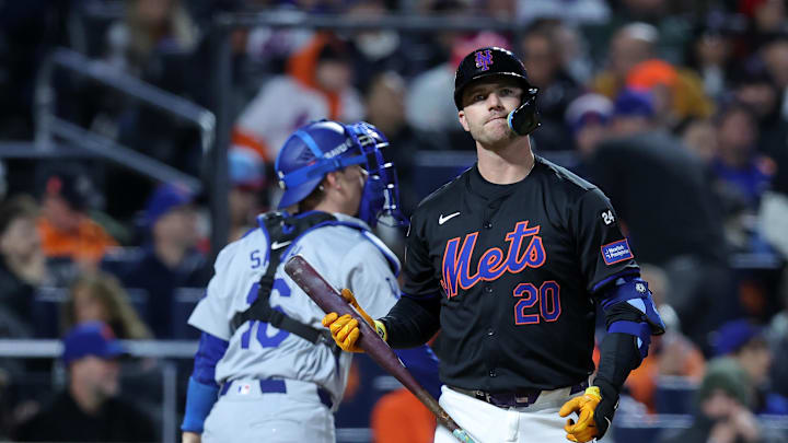 Oct 16, 2024; New York City, New York, USA; New York Mets first base Pete Alonso (20) reacts after striking out against the Los Angeles Dodgers in the first inning during game three of the NLCS for the 2024 MLB playoffs at Citi Field. Mandatory Credit: Brad Penner-Imagn Images