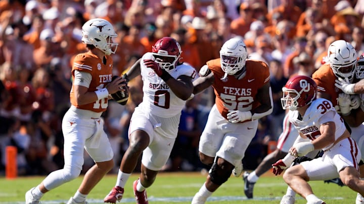 Texas Longhorns quarterback Arch Manning (16) looks to throw a pass in the first half of the Red River Rivalry college football game between the University of Oklahoma Sooners and the Texas Longhorn at the Cotton Bowl Stadium in Dallas, Texas, Saturday, Oct. 11, 2025.
