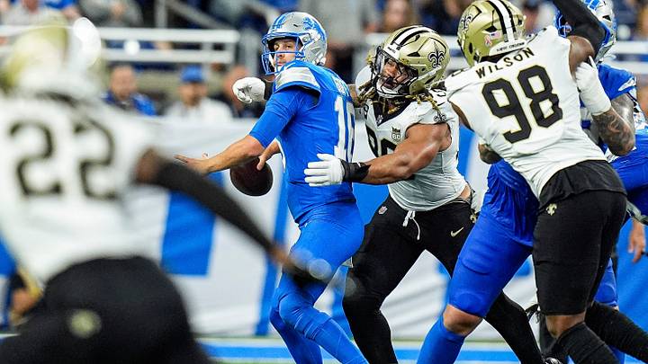 New Orleans Saints edge rusher Chase Young (99) tackles Detroit Lions quarterback Jared Goff (16) during the first half at Ford Field in Detroit on Sunday, Sept. 13, 2026. New Orleans Saints edge rusher Chase Young (99) tackles Detroit Lions quarterback Jared Goff (16) during the first half at Ford Field in Detroit on Sunday, Sept. 13, 2026.