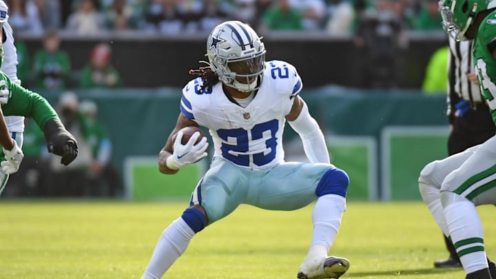 Dec 29, 2024; Philadelphia, Pennsylvania, USA; Dallas Cowboys running back Rico Dowdle (23) against the Philadelphia Eagles at Lincoln Financial Field. Mandatory Credit: Eric Hartline-Imagn Images